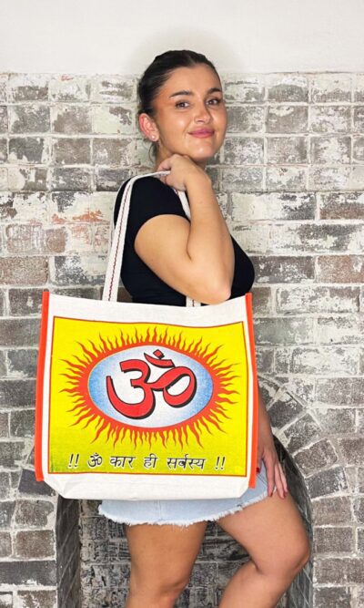 Beige canvas tote bag with gusset and yellow, blue and red om pattern