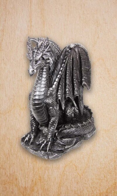 silver guarding dragon sculpture