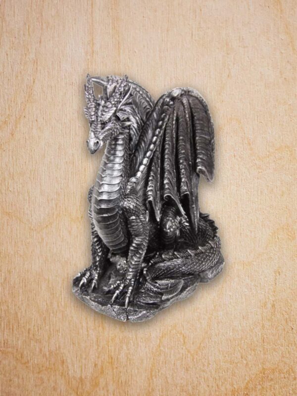 silver guarding dragon sculpture