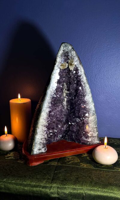 amethyst crystal cave on wooden base