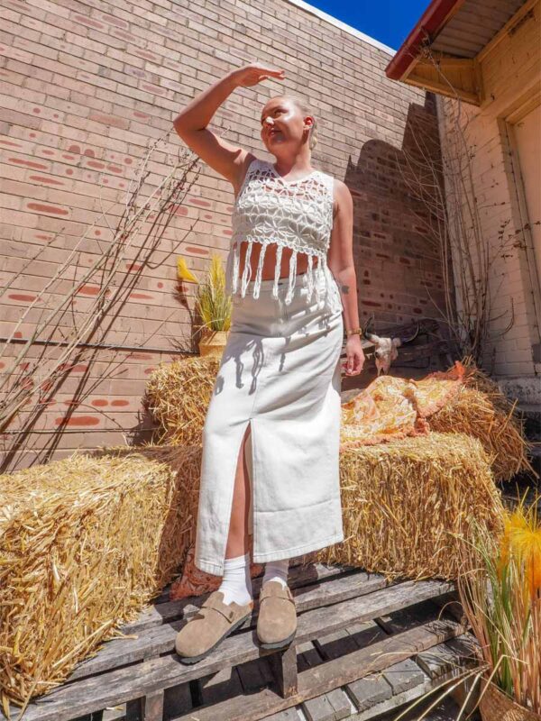 white denim maxi skirt and white crochet tassel top